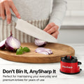 Person cutting onions with a knife on a wooden board next to an AnySharp knife sharpener.