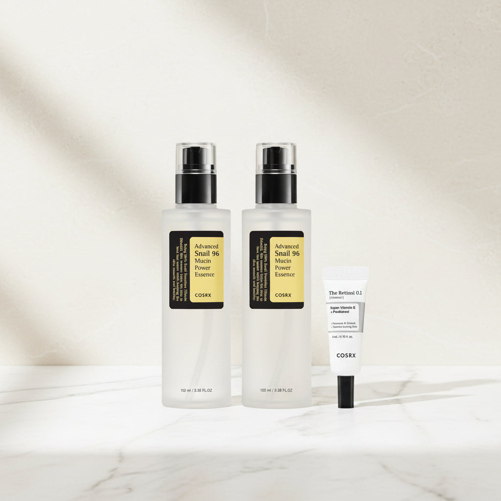 Two bottles and a tube of COSRX skincare products on a white background