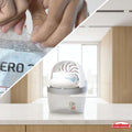 A close-up demonstration of hands applying a clear adhesive band from a Unibond brand packet to the edge of a white plastic container, with the band conforming tightly around the container. The Unibond logo is visible in the bottom right corner.
