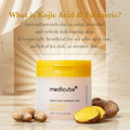 Medicube Kojic Acid Turmeric Pad with turmeric roots on a yellow background