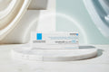 La Roche-Posay Cicoplast Baume B5+ skincare packaging box, 100 ml, featuring a white design with blue and black text and a blue square accent.