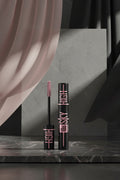 Mascara with 'Sky High' text on a black background