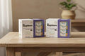 Two boxes of Applaws Variety Selection in Broth cat food, each showing four canned meals and a purple side panel, on a plain white background.