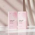 Two pink packaging boxes of Medicube PDRN 99 Pink Collagen Toning Gel Toner Pad on a white background.