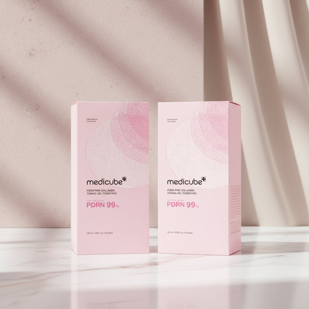 Two pink packaging boxes of Medicube PDRN 99 Pink Collagen Toning Gel Toner Pad on a white background.