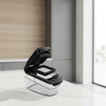 Black kitchen appliance with a clear container on a blurred background, labeled 'Premium Grade Construction'.