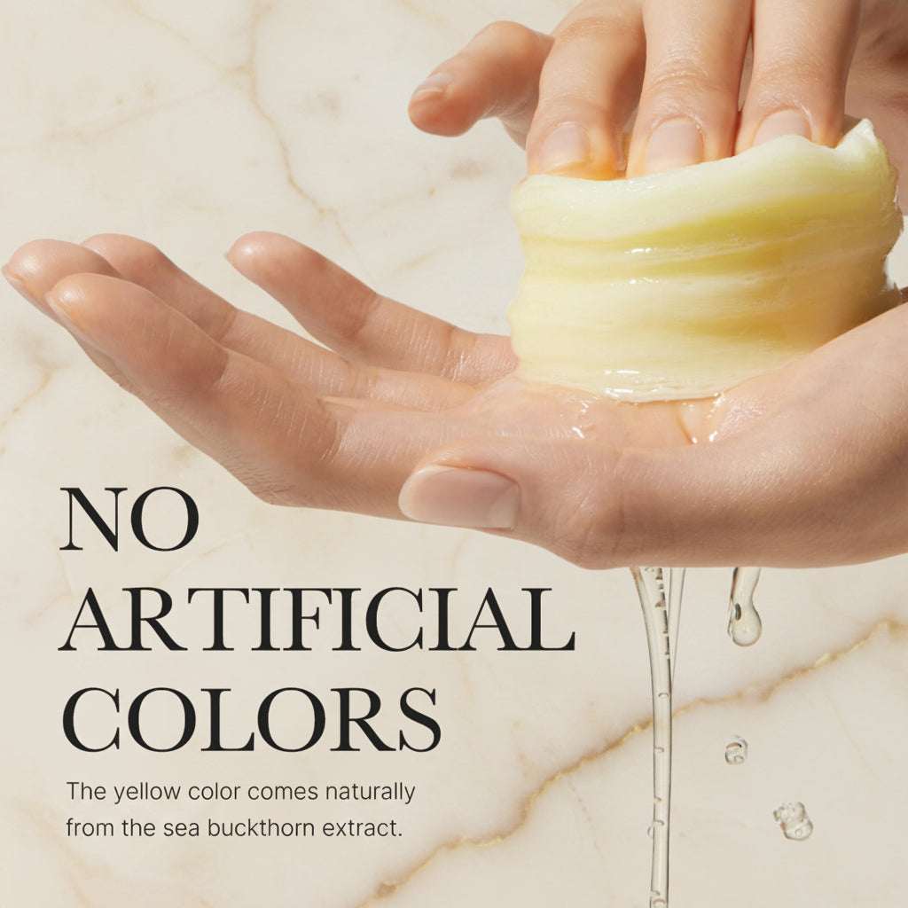 Hand holding a bar of soap with a natural yellow color, labeled 'No Artificial Colors'.
