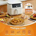 White air fryer on a wooden table with food items and packaging, labeled 'Multiple Uses'.