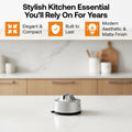 A kitchen drawer organizer tray made of light natural wood with multiple compartments, shown open with gold-toned utensils and a small round metallic organizer inside. Text at the top reads 'Stylish Kitchen Essential You'll Rely On For Years' with feature callouts: Elegant & Compact, Built to Last, and Modern Aesthetic & Matte Finish.