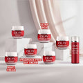 Olay Regenerist skincare products with labels on a pink background