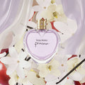 Vera Wang Princess perfume bottle surrounded by flowers with notes listed