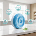 A promotional product graphic for a UniBond Aero 360° Moisture Absorber Waterfall Freshness Refill Tab. The design features a large blue circular cross-section of the refill tab with water droplets, a small green fern leaf, and several callout circles with text describing features like long-lasting performance, fast-acting speed, patented technology, and universal refill compatibility.