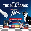 Promotional image of Purina Felix cat food packages with a hand reaching towards them on a blue background.