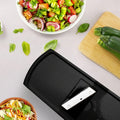 Black griddle with smartphone on a light gray background, featuring 'fullstar' branding.