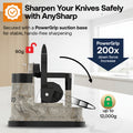 AnySharp knife sharpening stand with a PowerGrip suction base, shown on a light textured background with promotional text and icons indicating secure 60g to 12,000g down force and 200x increased power.