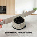 Knife being sharpened on a marble sharpener with vegetables in the background