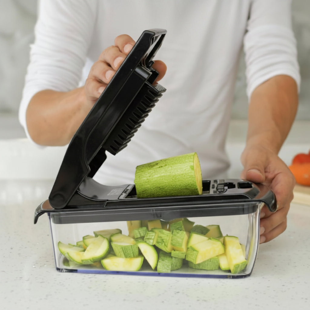 Person using a vegetable chopper to slice zucchini with 'Trusted & Tested' text above.