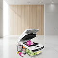 Multifunctional vegetable chopper with various attachments and chopped vegetables displayed.