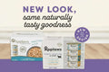 Promotional graphic for Applaws pet food showing two product boxes and a canister set on a beige and purple background with large headline text reading 'NEW LOOK, same naturally tasty goodness' and a circular 'NEW DESIGN' badge.