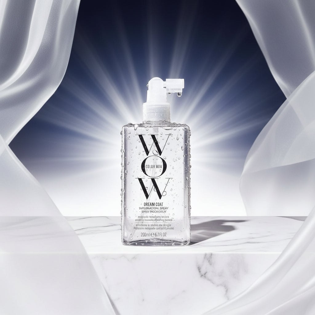 Bottle of WOW Haircare product with text 'The OG Frizz-Fighter' and '25 Major Beauty Awards' on a dark background.