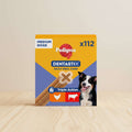 Pedigree Dentastix Daily Oral Care dog treats box for medium dogs, featuring a yellow and blue package design with a dog photo and an X-shaped treat visible through a clear window.