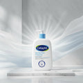 Cetaphil Gentle Skin Cleanser bottle with branding and product details on a light gray background