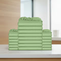 Stack of green fitted sheets on a white background
