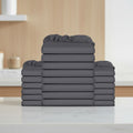Stack of gray fitted sheets on a white background