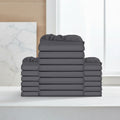 Stack of gray fitted sheets on a white background