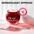 Red Olay Regenerist ultra RICH day cream jar with a white cap on a light background, featuring 'Dermatologist Approved' label.