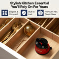 Red sharpie in a wooden drawer with gold utensils, labeled as a stylish kitchen essential.