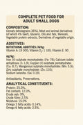 A close-up of a brown label showing complete pet food information for adult small dogs, including composition, additives, mg/kg values, and analytical constituents.
