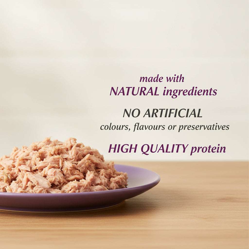 Purple plate with shredded meat and text about natural ingredients and high quality protein.
