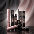 Maybelline Sky High mascara tubes on a starry background
