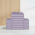 A stack of folded sheets in a solid light purple/lavender color, arranged symmetrically against a plain white background.