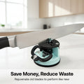 Knife sharpener on a kitchen counter with text 'Save Money, Reduce Waste' and 'Rejuvenate old blades to perform like new'.