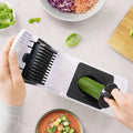 Vegetable chopper being used to chop a cucumber with 'fullstar' branding in the corner.