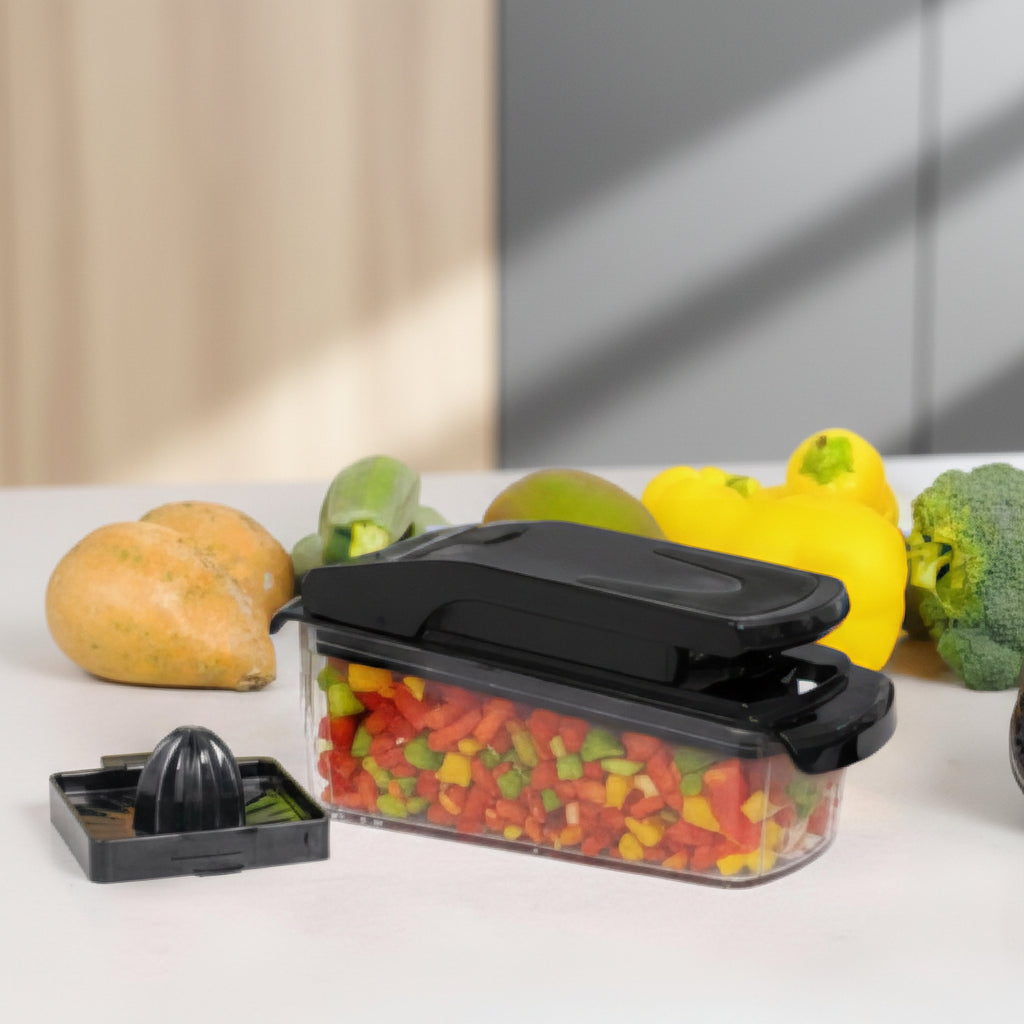 Fullstar Pro Chopper with chopped vegetables on a white background