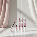 Two mascara tubes with a blue sky background and text about 'Extreme Lengte + Verzorging' and 'Sky High Tinted Primer'.