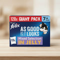 Purina Felix cat food packaging for a 120x giant pack of Mixed Selection in Jelly, featuring a blue box with a red top banner, white text, and a cartoon black-and-white cat peeking out.