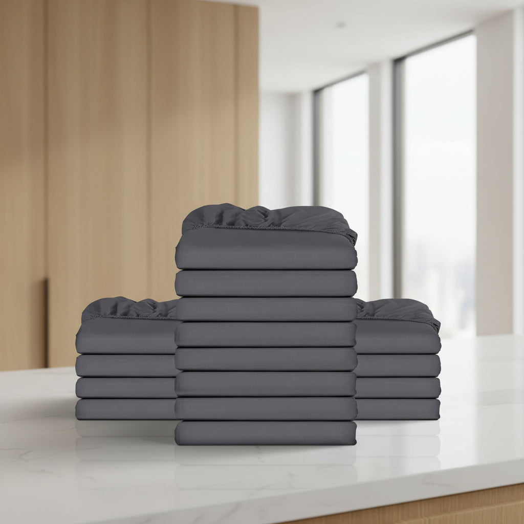 Stack of burgundy folded towels on a white background