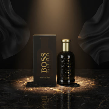 Hugo Boss bottled oud perfume bottle and packaging on a white background