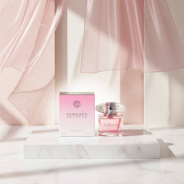 Versace Bright Crystal perfume bottle and packaging on a white background